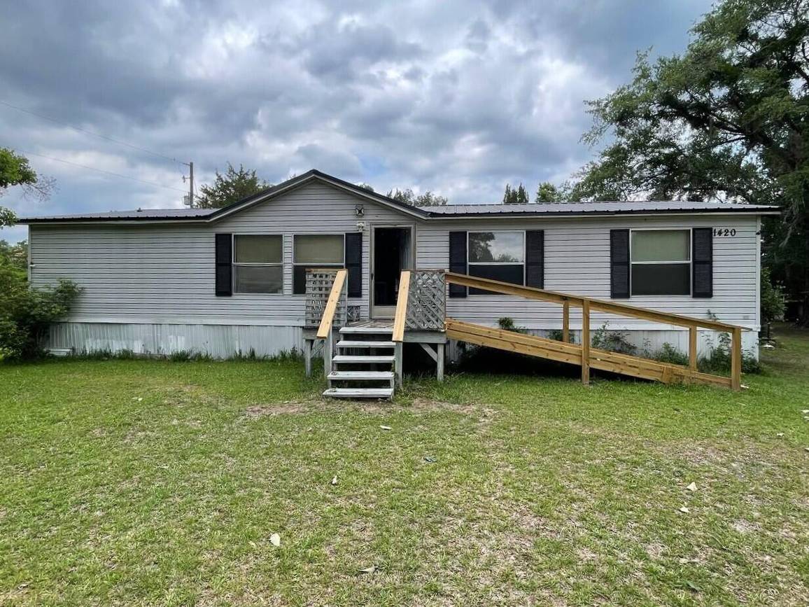 1420 Cross Swamp Road, Lodge SC, front exterior of manufactured home with new tin roof and wheelchair ramp